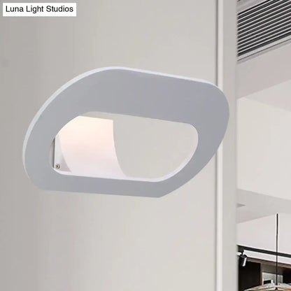 Modern minimalist wall lamp with black and grey oval shade featuring white wall-mounted sconce and soft diffused lighting