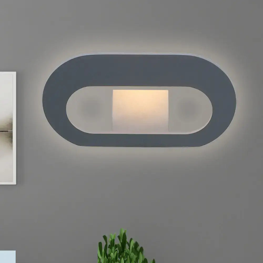 Modern minimalist wall lamp with dark gray oval shade frame and warm led lighting for bedroom use maximum bulb wattage 10w