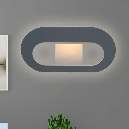 Modern minimalist wall lamp with dark gray oval shade frame and warm led lighting for bedroom use maximum bulb wattage 10w