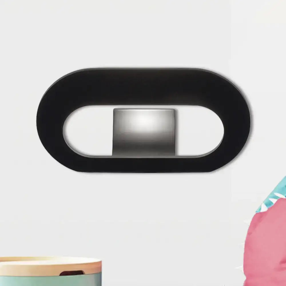 Modern minimalist black wall lamp with oval shade and metallic panel designed for bedroom lighting maximum bulb wattage included