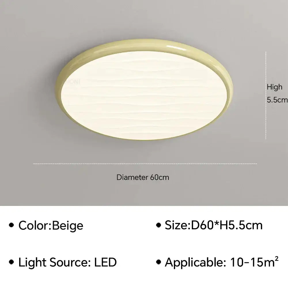 Beige oval decorbites led ceiling light with smooth textured surface and rounded edges for modern bedroom decor