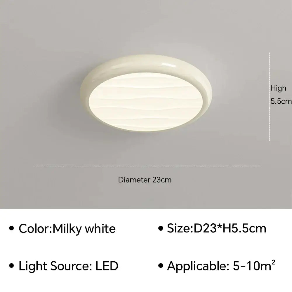 Modern minimalist black decorbites led ceiling light with milky white diffuser and subtle wavy texture for bedroom use