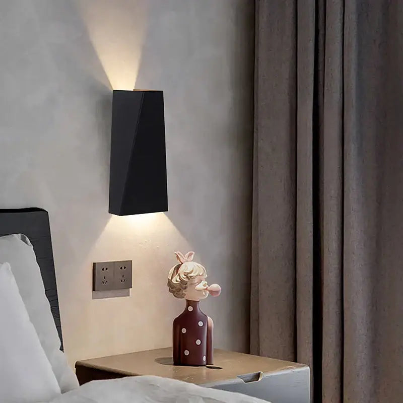 Modern minimalist black rectangular led wall lamp with sleek design ideal for bedroom reading light