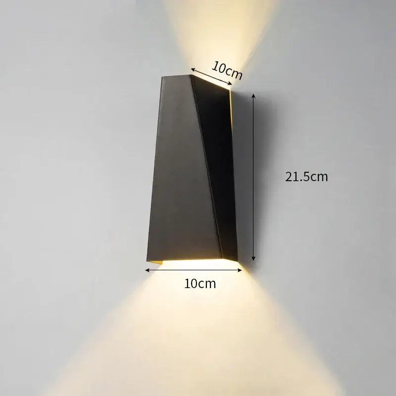 Modern minimalist black metal led wall lamp with sleek angular design and warm lighting for bedroom reading use