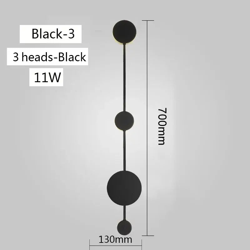 Black three-head modern minimalist led wall lamp with matte finish and geometric design for living space