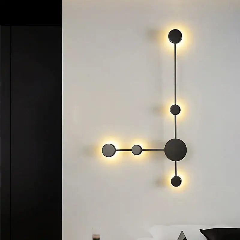 Modern minimalist black led wall lamp featuring five circular lights in an asymmetrical geometric design for living room