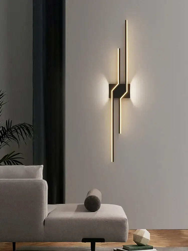 Modern minimalist black led wall lamp strip with gold-toned linear sconce and geometric design for living room