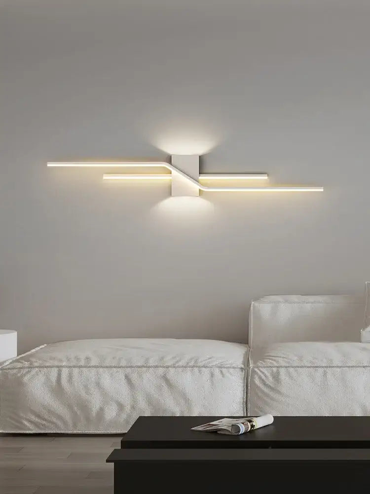 Modern minimalist black led wall lamp strip with sleek angular design and warm lighting for living room use