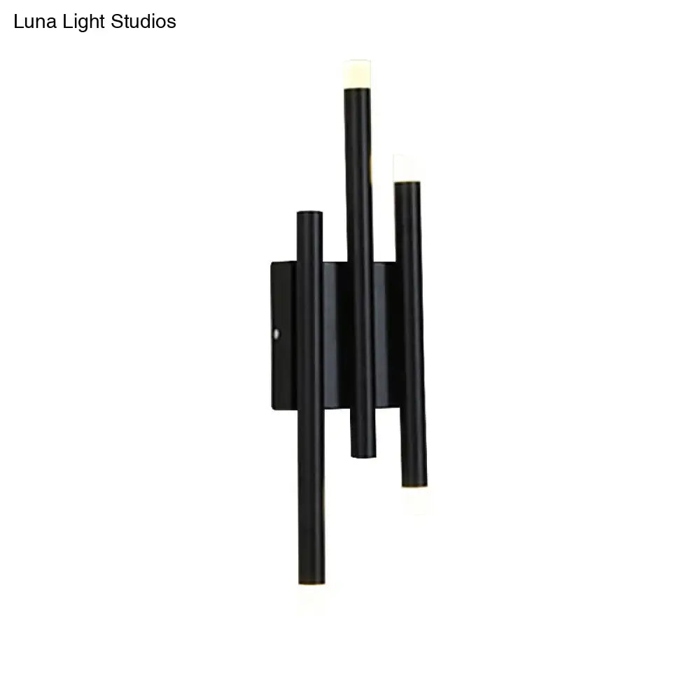 Modern minimalist black led wall lamp with three frosted glass arms offering versatile hallway light options