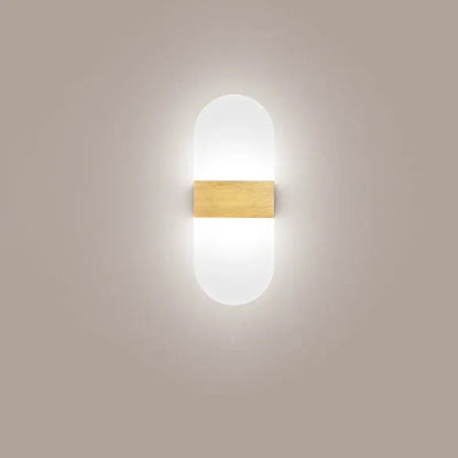 Modern oval-shaped black led wall light with frosted glass diffuser and brass accent bar for bedroom decorbites led wall light