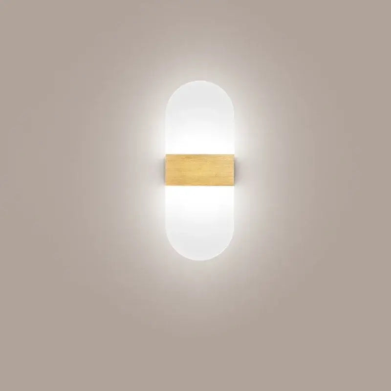 Modern oval-shaped black led wall light with frosted glass diffuser and brass accent bar for bedroom decorbites led wall light