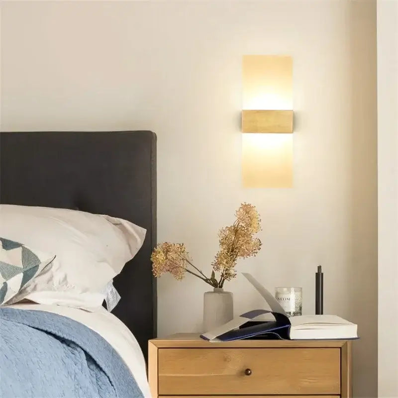 Modern minimalist black led wall light with warm golden glow and sleek rectangular design for bedroom decorbites led wall use