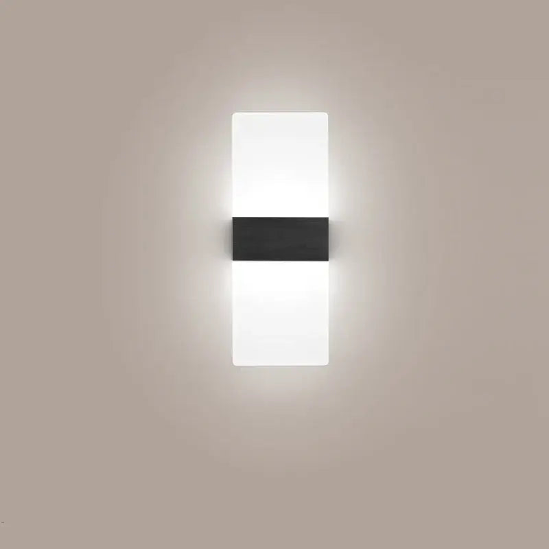 Modern minimalist black led wall light with sleek white acrylic diffuser and central black accent for bedroom decorbites led wall