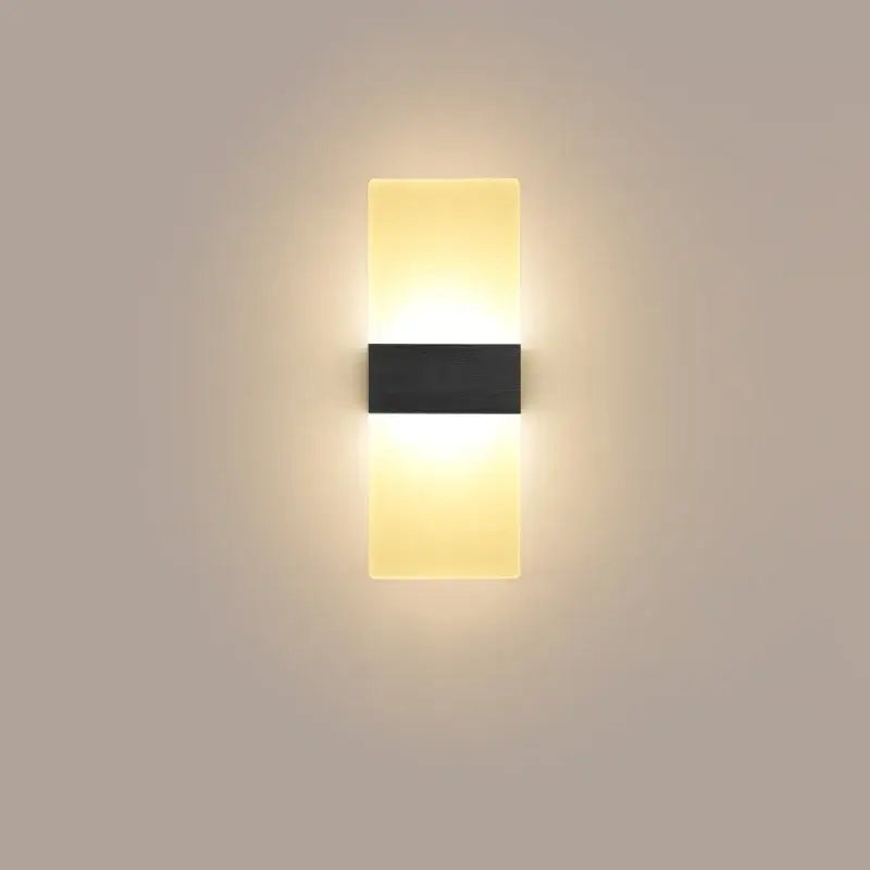 Modern minimalist black led wall light with sleek metal frame and two warm rectangular light panels for bedroom decorbites led wall