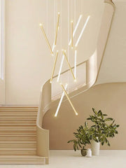 Modern minimalist black round tube led chandelier with slender gold and white rods in asymmetrical decorbites black round design