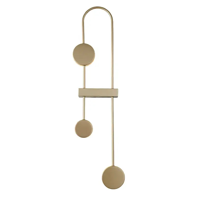 Modern gold-toned metal led wall light with minimalist geometric design featuring three circular discs and rectangular bar by decorbites