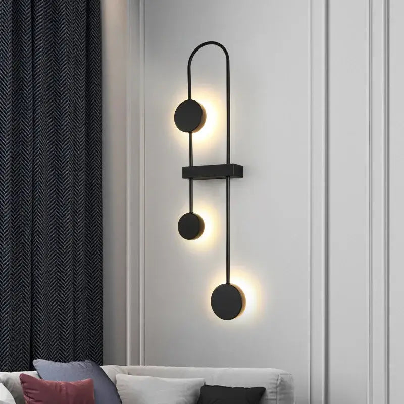 Modern minimalist black triple circle led wall light with sleek curved metal frame for bedroom decorbites led wall use