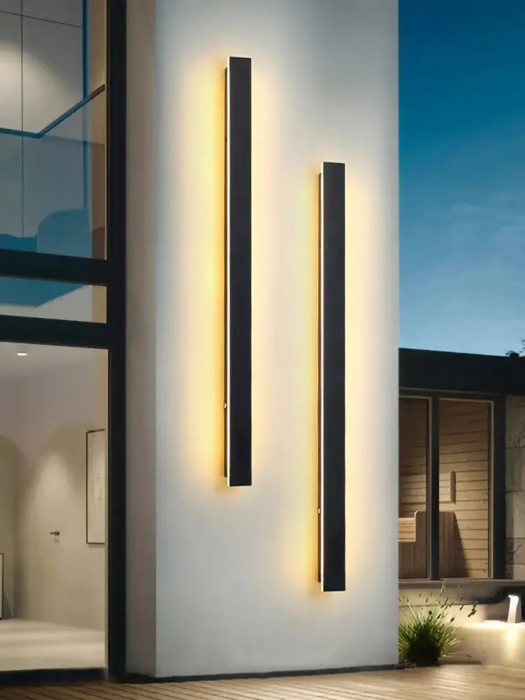 Two sleek black waterproof led wall lights with warm yellow lighting for modern minimalist decorbites garden decor