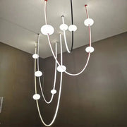 Modern minimalist ceiling chandelier with curved black and white cables and frosted glass decorbites colorized led dimmable lights