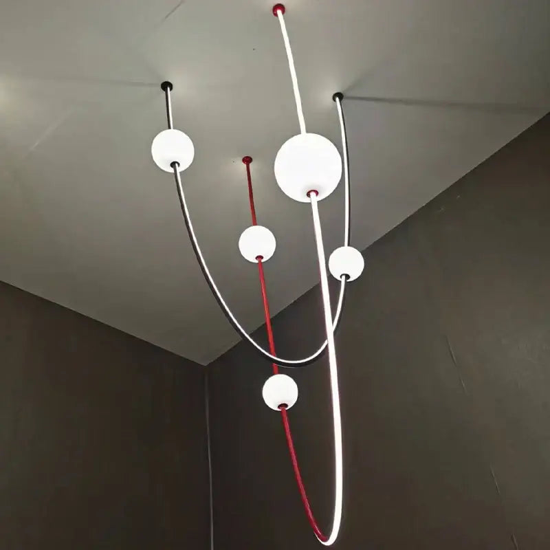 Modern abstract ceiling chandelier with white glass globes and black and red curved rods by decorbites colorized led dimmable