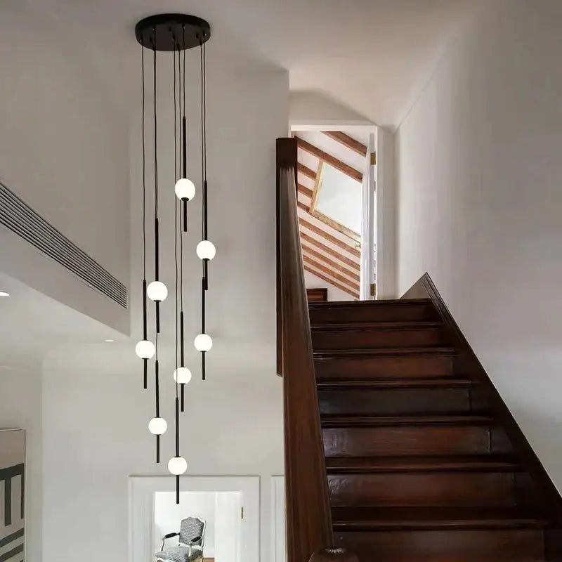 Modern minimalist black and white creative led chandelier with spherical white bulbs by decorbites creative led for living room decor