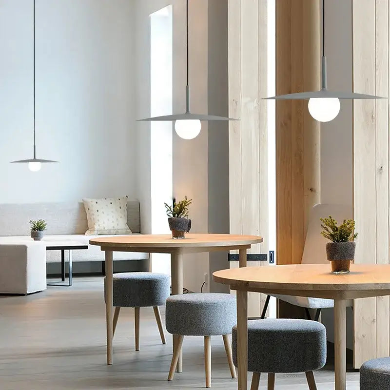 Modern minimalist pendant lights with matte gray flying saucer iron shades and white bulbs for decorbites chandelier