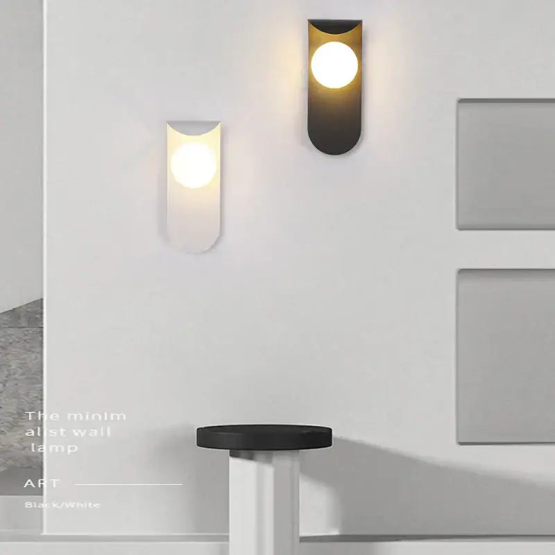 Modern minimalist black and white frosted glass ball led wall lamp with warm circular light for bedroom use