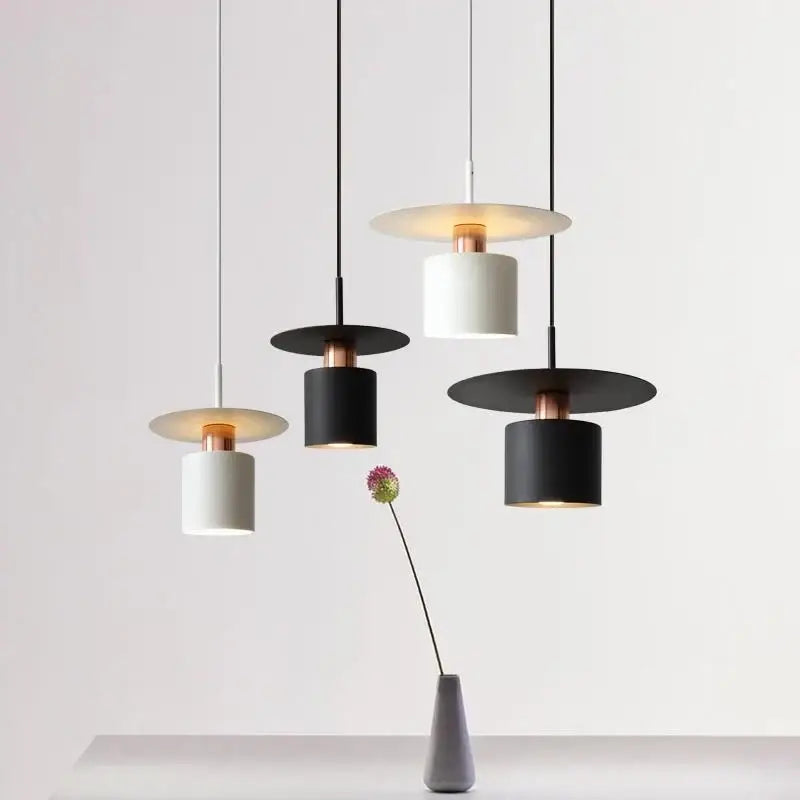 Modern minimalist black and white led pendant lights with copper fixtures for elegant kitchen lighting