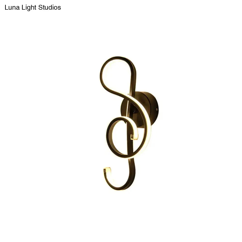 Modern minimalist black and white led ring sconce wall light shaped like a treble clef in dark metallic tone