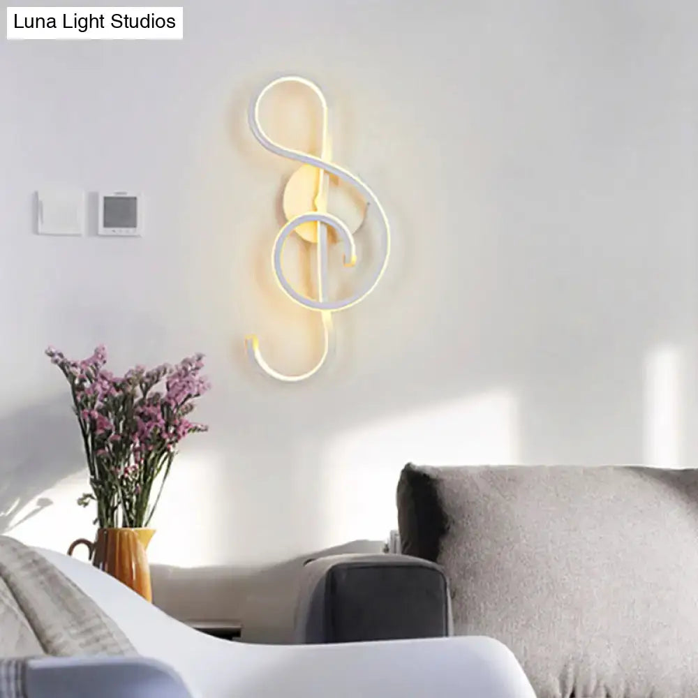 Modern minimalist black white led ring sconce shaped like a treble clef in white and warm yellow for bedroom wall light