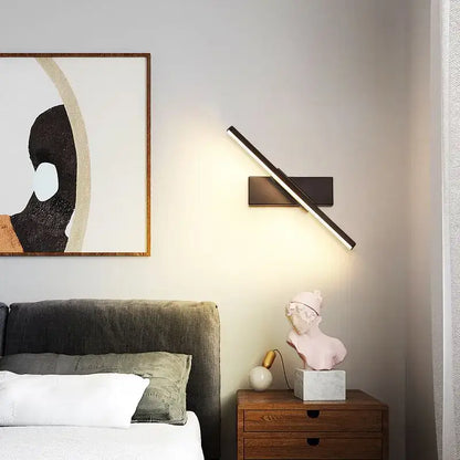 Modern minimalist black and white led wall lamp with sleek angular design for bedroom lighting use