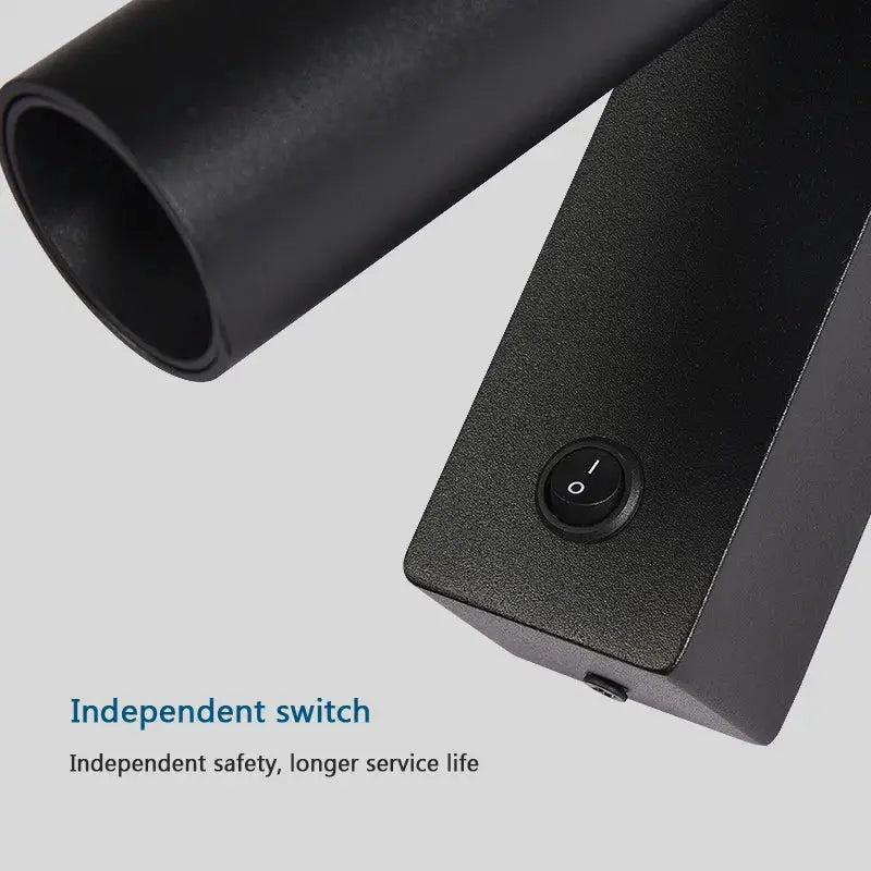 Modern minimalist black cylindrical led wall light with matte finish and independent on/off switch for bedroom decorbites led wall