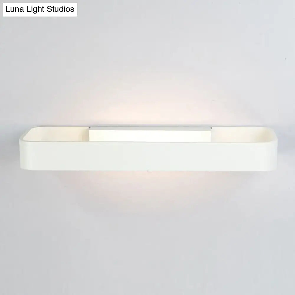 Minimalist white rectangular wall lamp with sleek modern design and soft ambient lighting for bedroom use