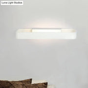 Modern minimalist white rectangular wall lamp with sleek design for bedroom lighting and wall mounting