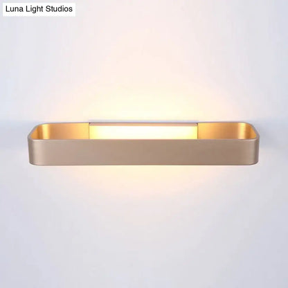 Gold-finished modern minimalist rectangular wall lamp with sleek design for bedroom lighting