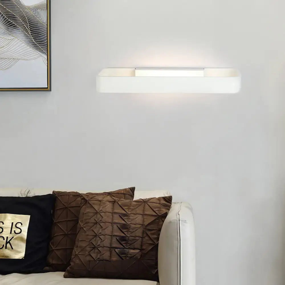 Modern minimalist black and white rectangular wall lamp with sleek white wall sconce design for bedroom lighting