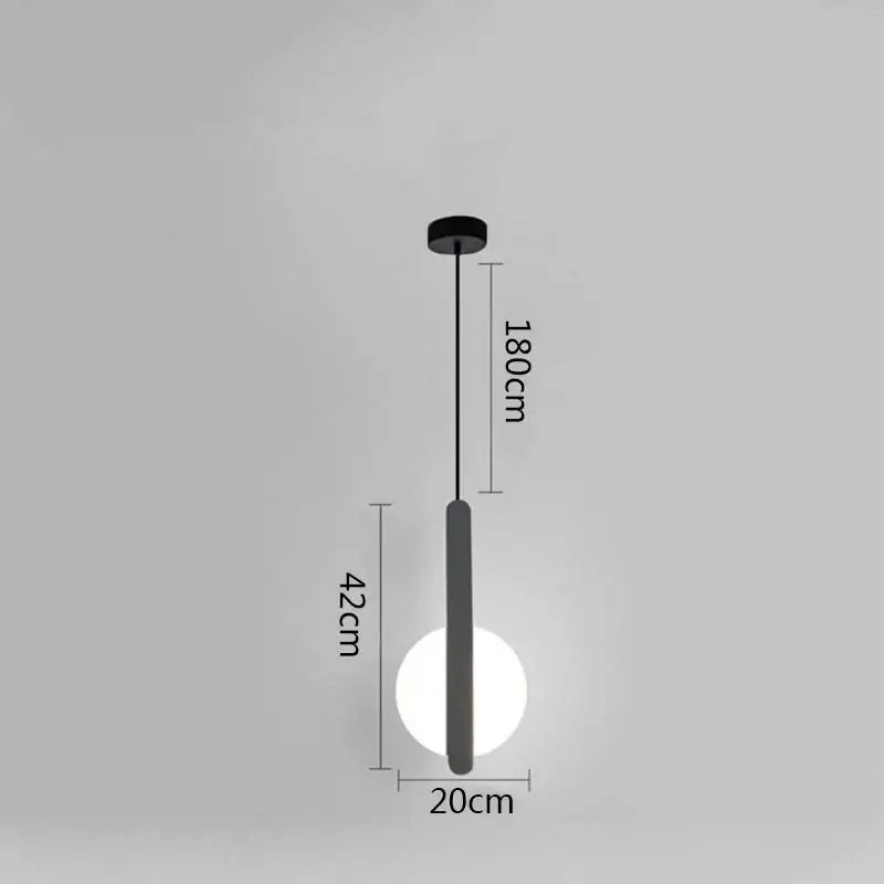 Modern minimalist black ring pendant lamp with sleek cylindrical stem and glowing white spherical bulb for dining room decorbites black ring pendant