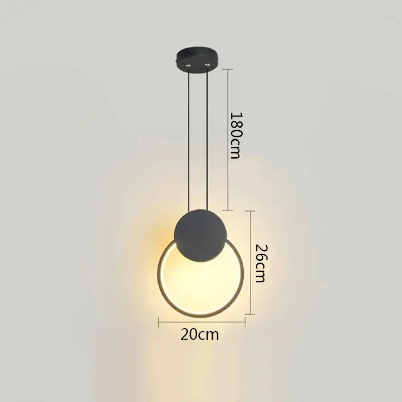Modern minimalist black ring pendant lamp with warm white circular glow and sleek matte finish for dining room decorbites black ring pendant