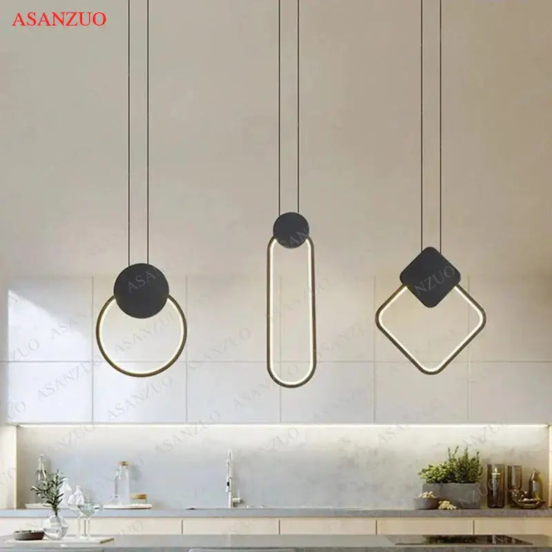 Modern minimalist black and gold geometric pendant lamp with circular, oval, and square frames for dining room decorbites black ring