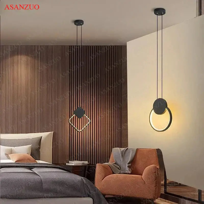 Modern minimalist black ring pendant lamp with sleek geometric design casting warm glow in dining room decorbites black ring