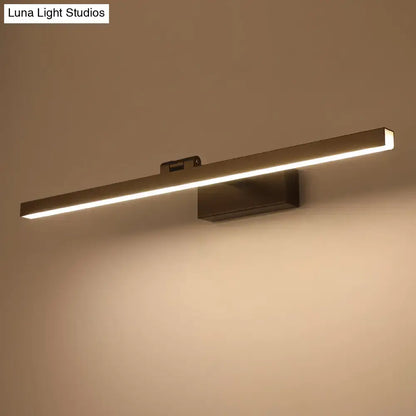 Modern brushed bronze rectangular tubular vanity lamp with sleek minimalist design for bathroom use