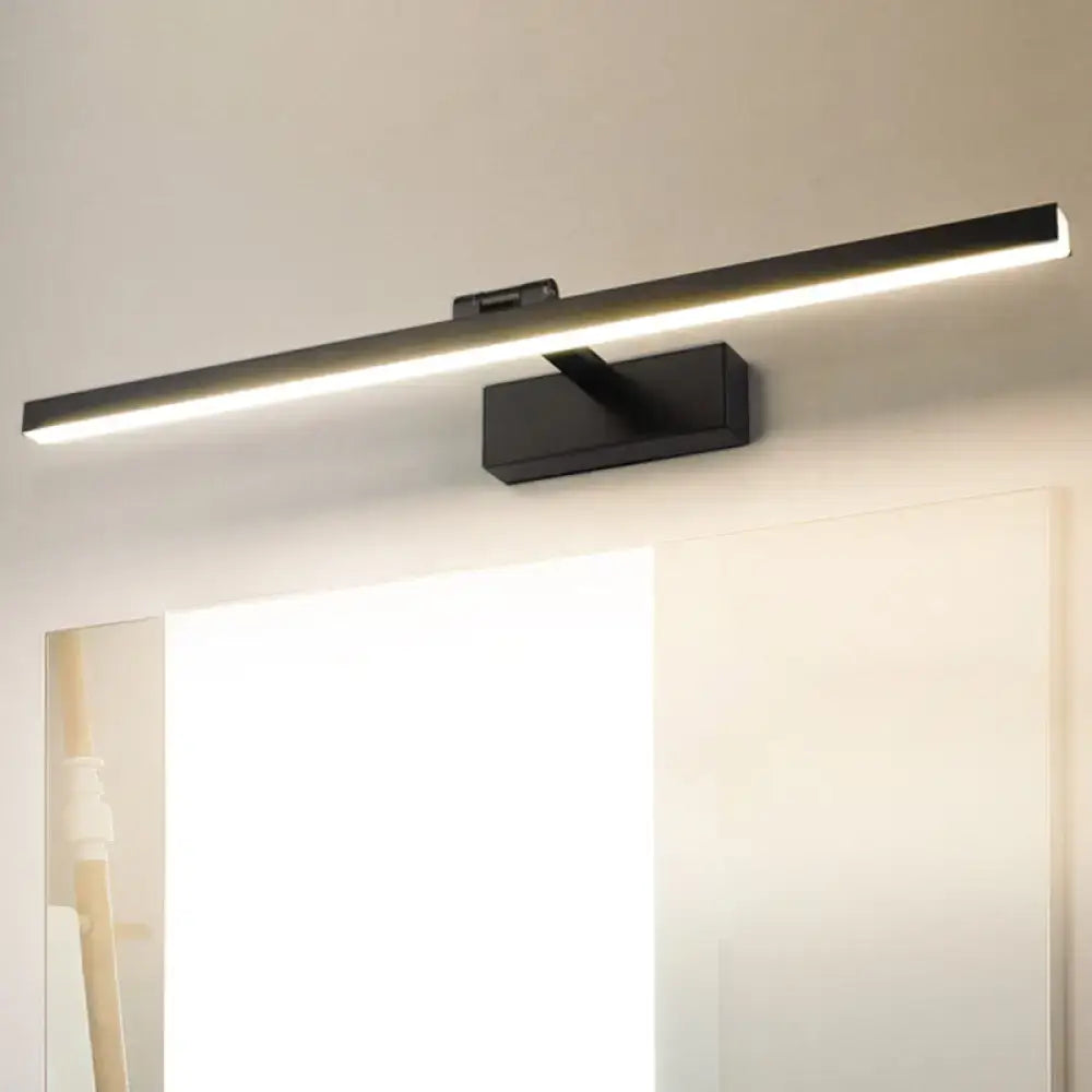 Modern minimalist black and white tubular vanity lamp with sleek rectangular design and integrated brightness control