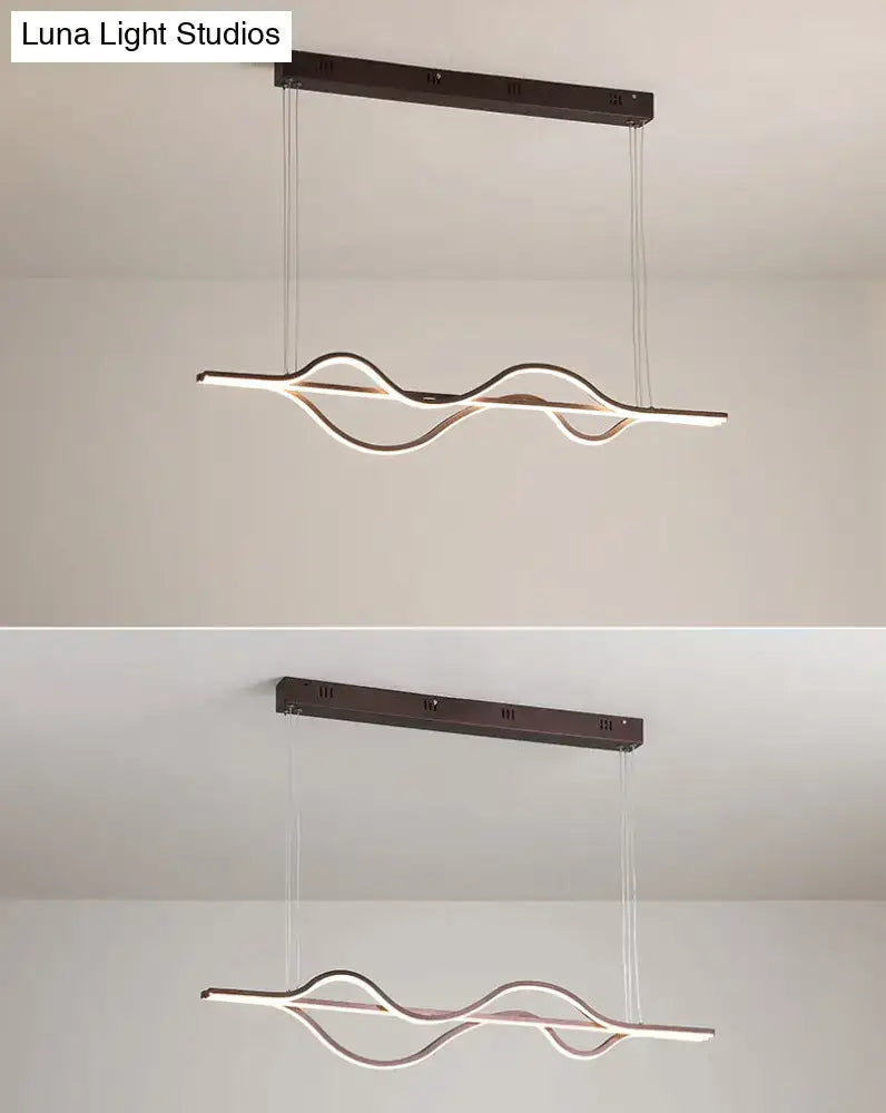 Modern minimalist black and white wave ceiling light with brushed bronze finish chain cord and adjustable color temperature