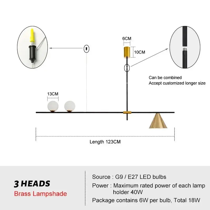 Modern minimalist brass and glass chandelier pendant light with three white spherical lampshades for dining room