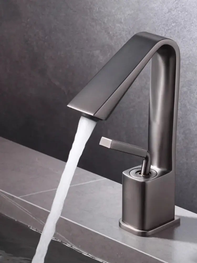 Modern matte black basin faucet with sleek angular design and single lever handle for decorbites brush gold basin use
