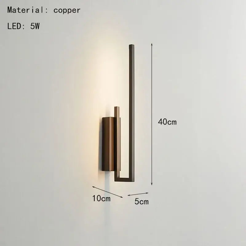 Modern minimalist brushed bronze and gold brass wall sconce with sleek vertical bars for bedroom decorbites brass wall use