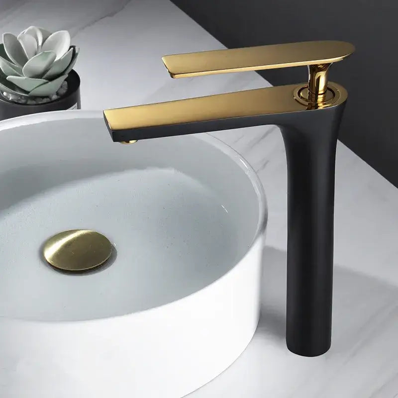 Modern minimalist basin faucet with brushed gold accents and sleek black body from decorbites brushed gold collection