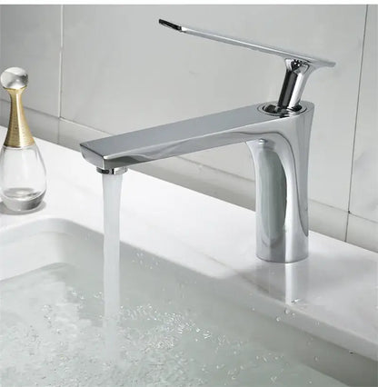 Modern chrome-finished single-handle basin faucet with sleek minimalist design in decorbites brushed gold bathroom style