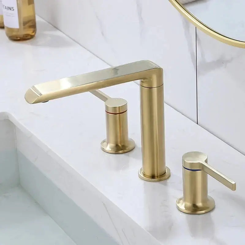 Modern minimalist brushed gold brass basin faucet with decorbites brushed gold finish and sleek minimalist design