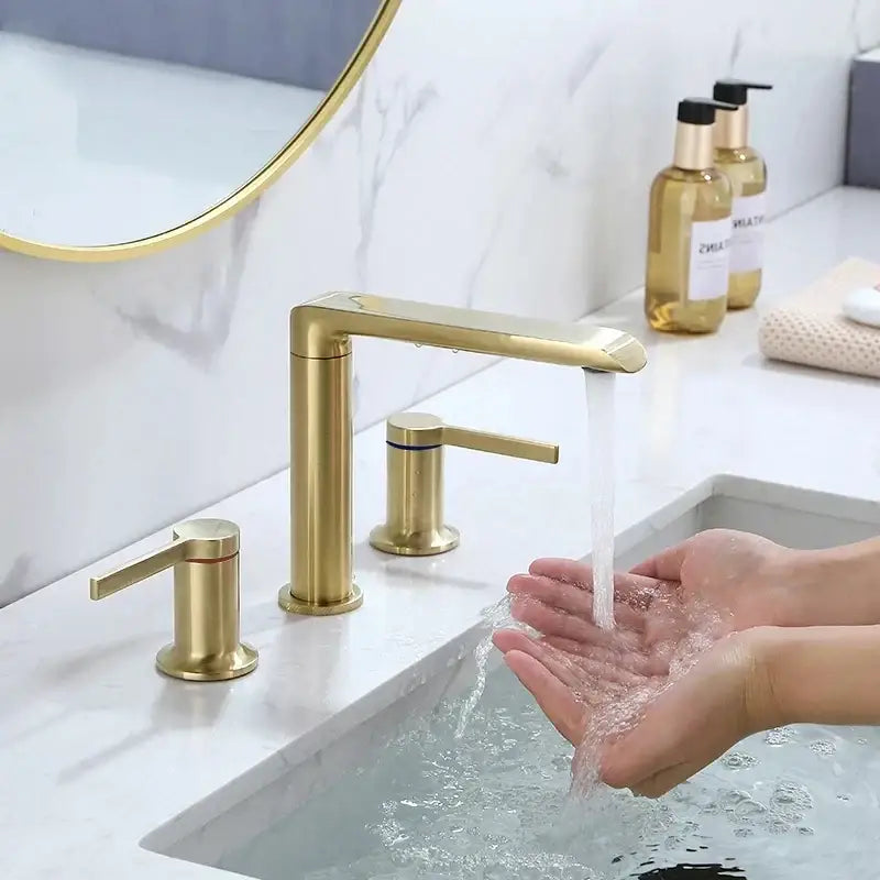 Modern minimalist brushed gold brass basin faucet with three handles in decorbites brushed gold for bathroom use